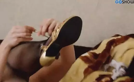 Female Masturbates with Foot Fetish